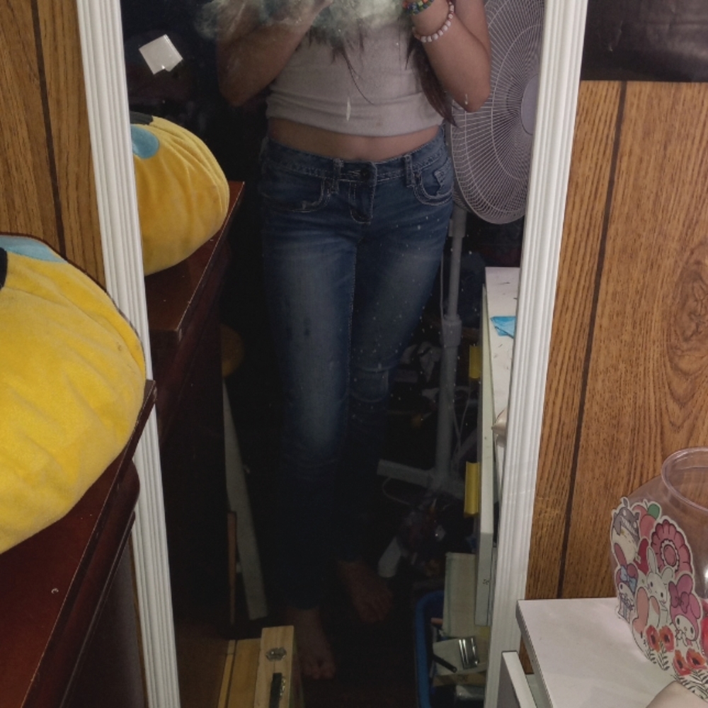 Low rise, size 3 Red camel slightly flared jeans. Dark-ish blue color.